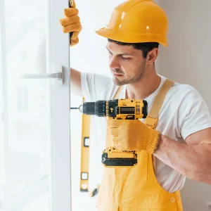 handyman-in-yellow-uniform-installs-new-window-e1663969295597.jpg handyman-in-yellow-uniform-installs-new-window-e1663969295597.jpg